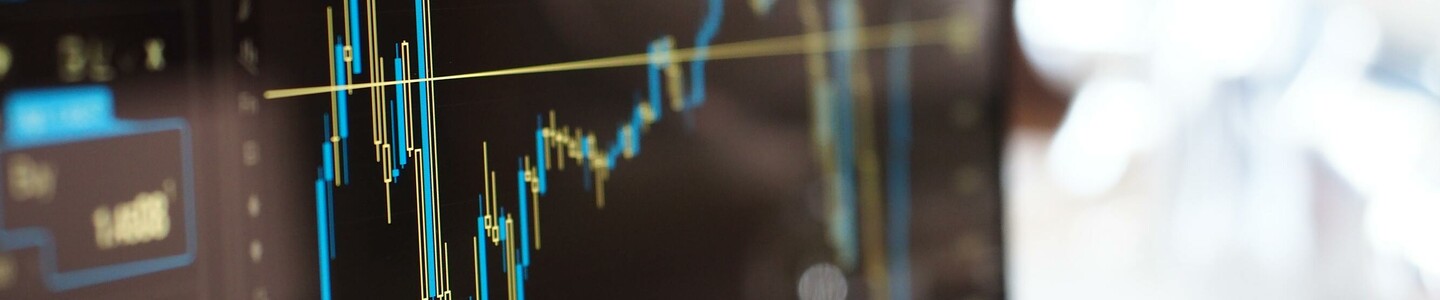 blue-and-yellow-graph-on-stock-market-monitor-159888